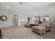 Bright living area with hardwood floors, neutral walls, open to the kitchen, featuring stylish decor and recessed lights at 17376 W Wildwood St, Surprise, AZ 85388