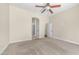 Spacious bedroom with neutral carpet and views of connecting bathroom at 2031 W Periwinkle Way, Chandler, AZ 85248