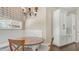 A charming breakfast nook featuring a wood table and built-in seating at 2031 W Periwinkle Way, Chandler, AZ 85248