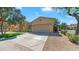 Beautiful single-story home with a well-manicured lawn and a two-car garage on a sunny day at 2031 W Periwinkle Way, Chandler, AZ 85248