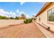 Side yard features a paved walkway and potential for landscaping, providing a versatile outdoor space at 20423 S 186Th St, Queen Creek, AZ 85142
