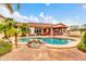 Expansive backyard view featuring a sparkling pool, a covered patio, and beautifully landscaped grounds, perfect for outdoor enjoyment at 20423 S 186Th St, Queen Creek, AZ 85142