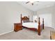 Classic bedroom showcases a wooden four-poster bed and side table at 20423 S 186Th St, Queen Creek, AZ 85142