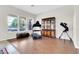 This bonus space is a flexible area perfect for a home gym, featuring a treadmill and display cabinet at 20423 S 186Th St, Queen Creek, AZ 85142