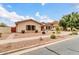 Beautiful home featuring desert landscaping, stone accents, and a paved walkway at 20423 S 186Th St, Queen Creek, AZ 85142