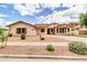 Charming single-story home showcasing well-manicured landscaping and a welcoming entrance at 20423 S 186Th St, Queen Creek, AZ 85142