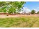 Lush green space within the community, offering serene views of nearby homes and landscaping at 20423 S 186Th St, Queen Creek, AZ 85142