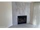 Living room features a fireplace and tile flooring at 2100 W Lemon Tree Pl # 29, Chandler, AZ 85224
