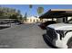 Parking lot with covered parking at 2100 W Lemon Tree Pl # 29, Chandler, AZ 85224