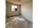 Bedroom with a window allowing natural light in, awaiting your personal touch and design ideas at 2134 E Harvard St, Phoenix, AZ 85006