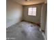 A view of bedroom with window showing natural light; customize the space to suit your personal taste at 2134 E Harvard St, Phoenix, AZ 85006