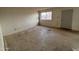 Spacious room featuring a window for natural light at 2134 E Harvard St, Phoenix, AZ 85006