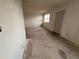 A bright room with neutral walls and a window at 2134 E Harvard St, Phoenix, AZ 85006