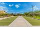 View of community bocce ball court with benches and landscaping at 22184 N 101St Dr, Peoria, AZ 85383