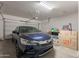 Spacious two car garage offers room for vehicles and storage at 22184 N 101St Dr, Peoria, AZ 85383