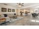 Spacious open-concept living area seamlessly connecting to the kitchen and dining space, perfect for modern living at 22184 N 101St Dr, Peoria, AZ 85383