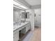 Bathroom showcasing vanity with granite countertops, cabinets, and a spacious tiled floor at 2363 Leisure World --, Mesa, AZ 85206