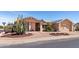 Inviting single-story home with desert landscaping and solar panels for energy efficiency at 2363 Leisure World --, Mesa, AZ 85206