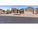 Inviting single-story home with desert landscaping and solar panels for energy efficiency at 2363 Leisure World --, Mesa, AZ 85206