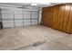 Spacious two car garage featuring lots of built-in wooden cabinets for ample storage at 2363 Leisure World --, Mesa, AZ 85206