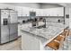 Modern kitchen featuring white cabinets, granite countertops, and stainless steel appliances at 2363 Leisure World --, Mesa, AZ 85206