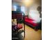 Bedroom with a bunkbed and single bed, ideal for shared spaces and restful nights at 2377 W Hazelwood St, Phoenix, AZ 85015