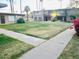 Spacious front yard and outdoor space for relaxation and leisure activities at 2377 W Hazelwood St, Phoenix, AZ 85015