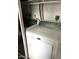 A laundry room with a white washer and dryer at 2377 W Hazelwood St, Phoenix, AZ 85015