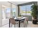 Elegant dining area with a modern table and chairs, perfect for Gathering meals and entertaining at 24105 W Flores Dr, Buckeye, AZ 85326