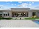 Expansive backyard with a covered patio, seamlessly blending indoor and outdoor living spaces at 2821 E Cashman Dr, Phoenix, AZ 85050