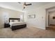 Spacious bedroom with plantation shutters and neutral palette at 2821 E Cashman Dr, Phoenix, AZ 85050