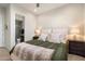 Neutral bedroom featuring an ensuite bathroom at 2821 E Cashman Dr, Phoenix, AZ 85050