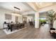 Open-concept dining area featuring an elegant light fixture and seamless flow to the living spaces at 2821 E Cashman Dr, Phoenix, AZ 85050