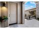 Inviting front entrance with a modern door, stylish lighting, and a view of the private courtyard at 2821 E Cashman Dr, Phoenix, AZ 85050