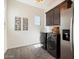 Well-equipped laundry room with modern appliances, cabinetry, and stylish decor at 2821 E Cashman Dr, Phoenix, AZ 85050