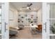 Stylish home office with built-in shelving, modern furniture, and a contemporary design at 2821 E Cashman Dr, Phoenix, AZ 85050