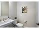 Simple half bath featuring a pedestal sink at 2821 E Cashman Dr, Phoenix, AZ 85050