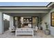 Cozy outdoor patio area with comfortable seating, perfect for relaxing or entertaining guests at 2916 E Sells Dr, Phoenix, AZ 85016