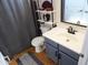 Close-up of full bathroom showcasing the vanity, sink, toilet, decorative shelving and mirror at 2927 N Oregon St # 7, Chandler, AZ 85225