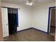 Bedroom featuring wood look floors, and a dark curtain for added privacy at 3112 W Taylor St, Phoenix, AZ 85009