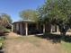 Single story home featuring desert landscaping, small covered porch, and neutral paint scheme at 3112 W Taylor St, Phoenix, AZ 85009