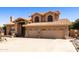 Charming home boasts a tile roof, mature landscaping, and a spacious three-car garage at 3538 E Squawbush Pl, Phoenix, AZ 85044