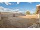 Large backyard featuring a block wall, space for recreation, and shade at 3632 W Mariposa St, Phoenix, AZ 85019