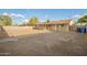 Expansive backyard offering ample space, a covered patio, and privacy fencing at 3632 W Mariposa St, Phoenix, AZ 85019