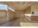 Covered carport area showcasing brick accents and a convenient mailbox at 3632 W Mariposa St, Phoenix, AZ 85019