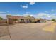 Single-story home with a covered carport, neutral exterior, and minimalist landscaping at 3632 W Mariposa St, Phoenix, AZ 85019