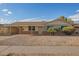 Charming single-story home featuring a covered carport and low-maintenance landscaping at 3632 W Mariposa St, Phoenix, AZ 85019