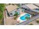 Aerial view showing the backyard features pool and desert landscaping at 3724 E Derringer Way, Gilbert, AZ 85297