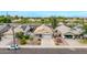 Aerial view of property featuring well-maintained landscaping, and desert surroundings at 3724 E Derringer Way, Gilbert, AZ 85297