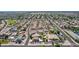 Wide aerial perspective capturing a planned community with single-Gathering homes, streets, and green spaces at 3724 E Derringer Way, Gilbert, AZ 85297
